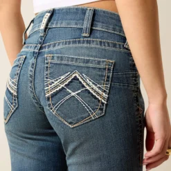 R.E.A.L. Mid Rise Whipstitch Boot Cut Jean