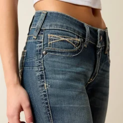 R.E.A.L. Mid Rise Whipstitch Boot Cut Jean