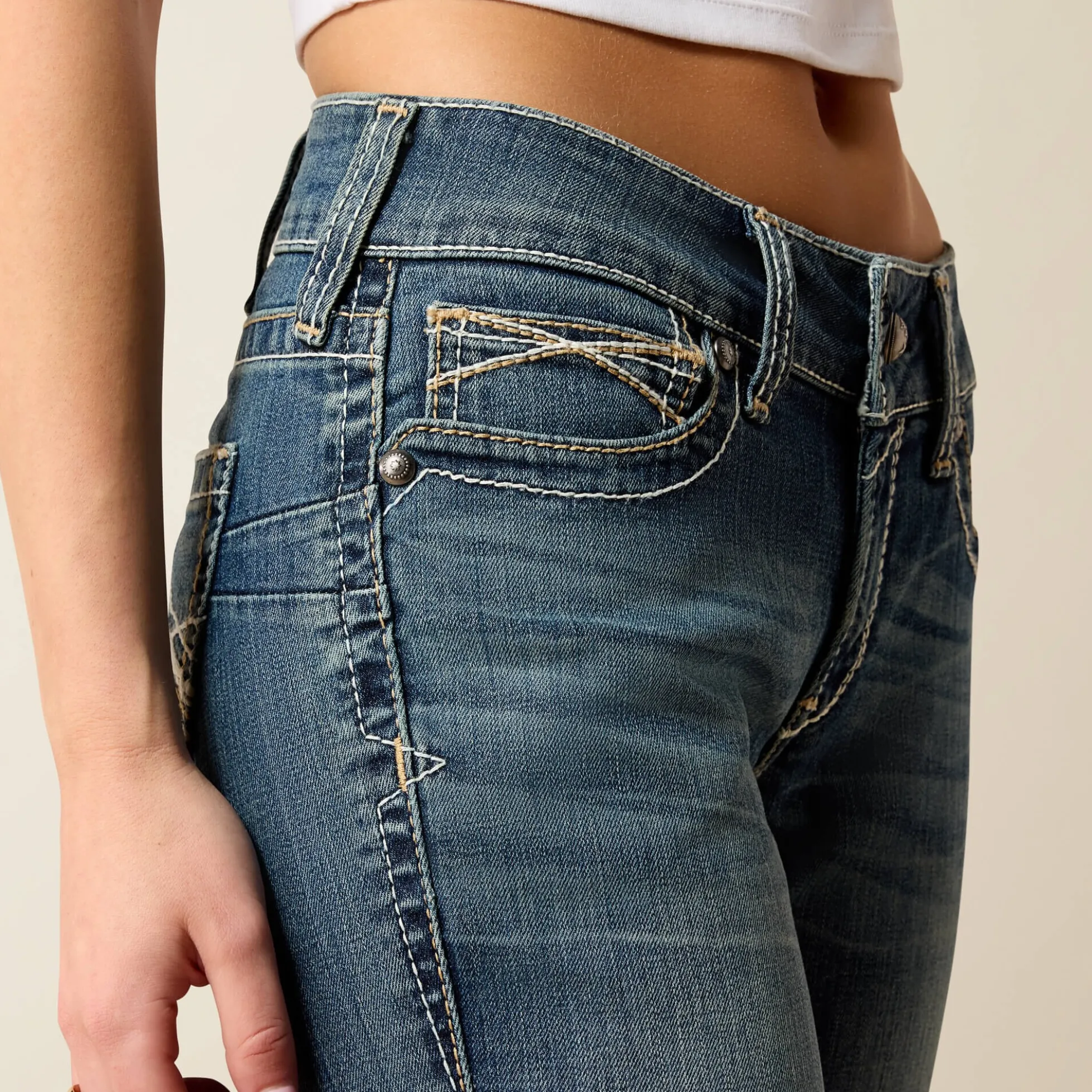 R.E.A.L. Mid Rise Whipstitch Boot Cut Jean